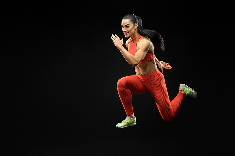 Woman running outdoors as a form of exercise-based relaxation